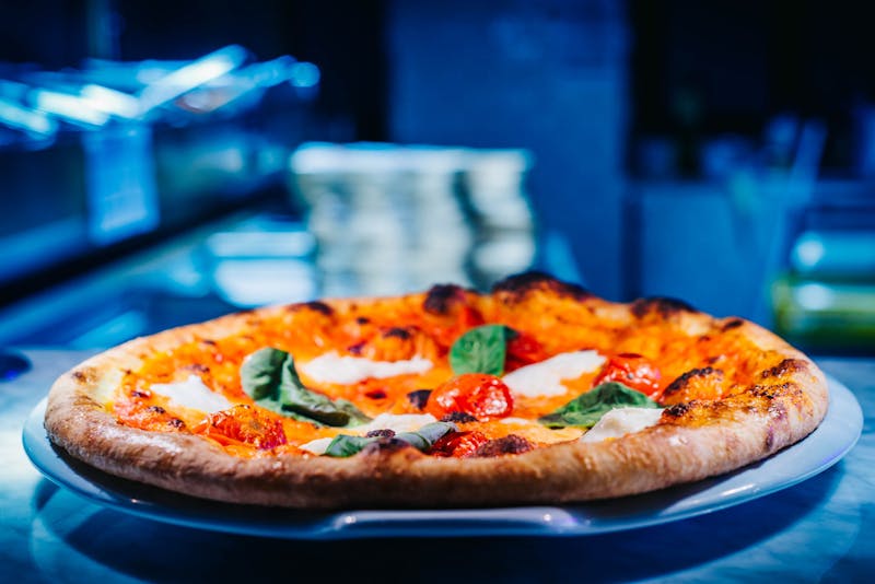 Margherita pizza with fresh basil and buffalo mozzarella